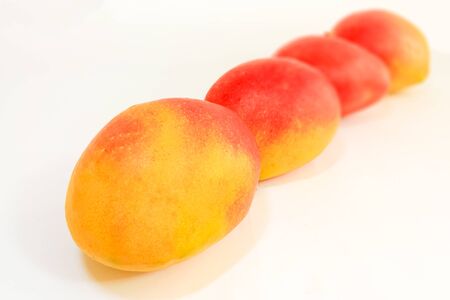 Mango fruit isolated on white backgroundの写真素材