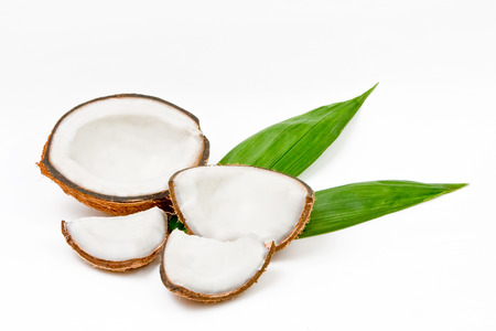 Ripe coconut open isolated on white backgroundの写真素材