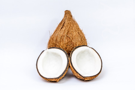 Ripe coconut open isolated on white backgroundの写真素材