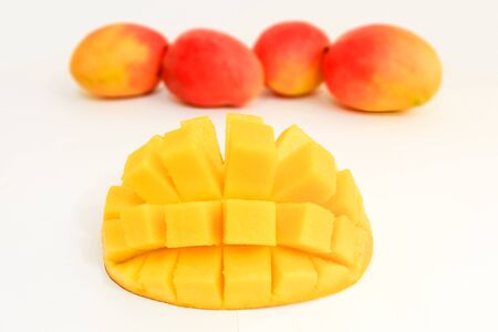 Mango cubed isolated on white backgroundの写真素材