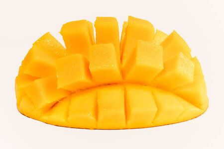 Mango cubed isolated on white backgroundの写真素材