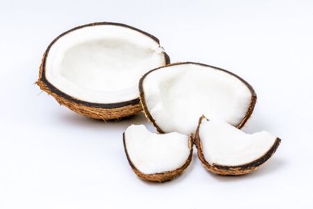 Ripe coconut open isolated on white backgroundの写真素材