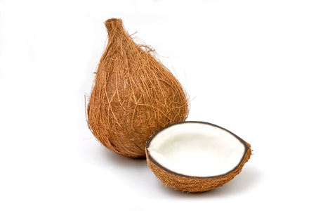 Ripe coconut open isolated on white backgroundの写真素材
