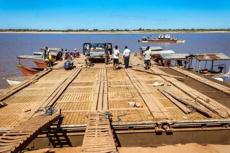 People waiting ferry  on july 3, 2017 on the landing stage of Belo sur Tsiribihina, western Madagascarのeditorial素材