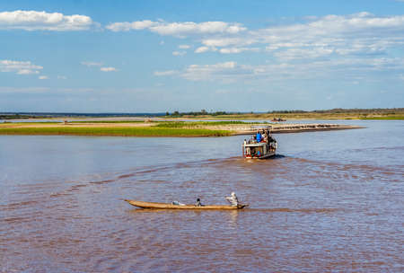 Tourists in a touristic barge along the river Tsiribihina, Western Madagascar on June 30, 2017のeditorial素材