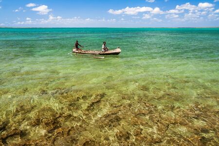 Malagasy couple in their outrigger canoe in the lagoon of Andavadoaka, Southwestern Madagascar on October 25, 2016のeditorial素材