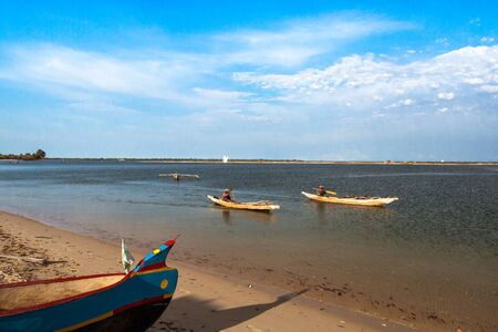 Malagasy villagers of Vezo ethnicity rowing in their dugout canoes in Belo sur Mer, western Madagascar on October, 28, 2016のeditorial素材