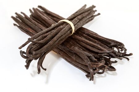 Bundles of vanilla pods from Madagascar tied with raffiaの写真素材