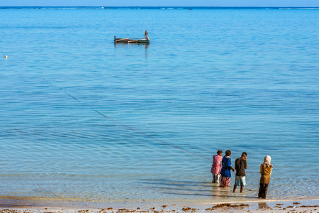 Tsifota, Madagascar, June 08, 2017: Fishing scene of Malagasy fishermen of the Vezo ethnic group in the edge of the Ambatomilo lagoon in southwestern Madagascarのeditorial素材