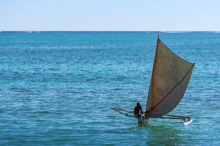 Tsifota, Madagascar, June 08, 2017:  Malagasy fishing sailboat of the Vezo ethnic group in the Ambatomilo lagoon in southwestern Madagascarのeditorial素材