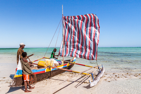 Ankasy, Madagascar, july 21, 2017: Vezo fishermen and their outrigger canoe on the beach of Ankasy, southwestern Madagascarのeditorial素材