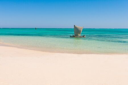 Tsifota, Madagascar, June 09, 2017:  Malagasy fishing sailboat of the Vezo ethnic group in the Ambatomilo lagoon in southwestern Madagascarのeditorial素材