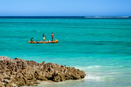 Tsifota, Madagascar, June 07, 2017: Malagasy fishermen fishing with their traditional outrigger canoe in the lagoon of southwestern Madagascarのeditorial素材
