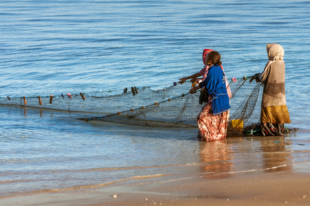 Tsifota, Madagascar, June 08, 2017: Fishing scene of Malagasy fishermen of the Vezo ethnic group in the edge of the Ambatomilo lagoon in southwestern Madagascarのeditorial素材