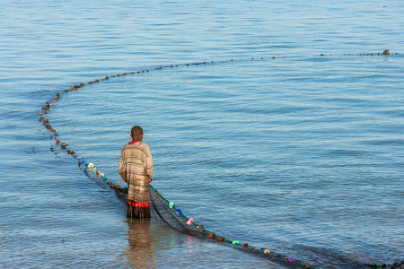 Tsifota, Madagascar, June 08, 2017: Fishing scene of Malagasy fisherman of the Vezo ethnic group in the Ambatomilo lagoon, southwestern Madagascarのeditorial素材