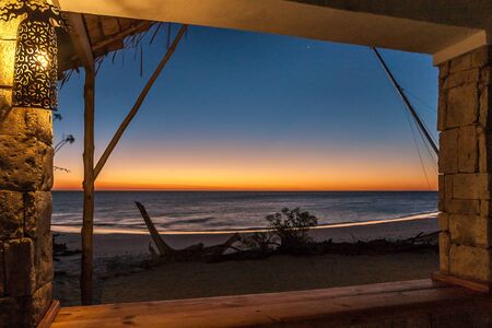 The sunset seen from the restaurant on the beach in southwestern madagascarの写真素材