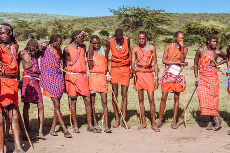 Masai Mara, Kenya, May 23, 2017: Masai warriors in traditional costume lined up during a ceremonyのeditorial素材