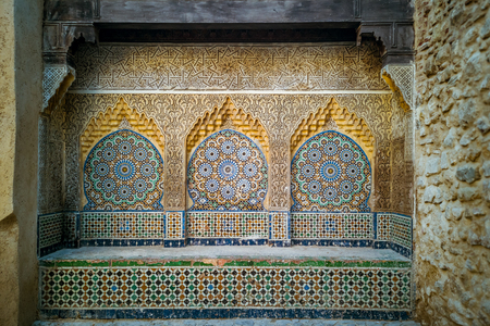 Traditional ornate and colorful arabesque carvings in the medina of Tangier, Moroccoの写真素材