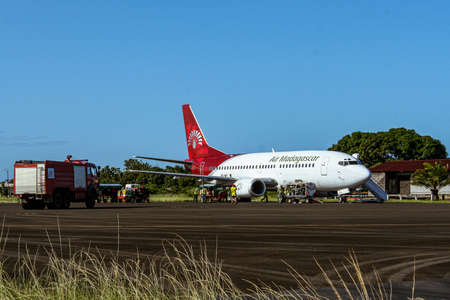An Air Madagascar Boeing 737 refueling on the runway at Sambava airport in Madagascar on January 14, 2019のeditorial素材