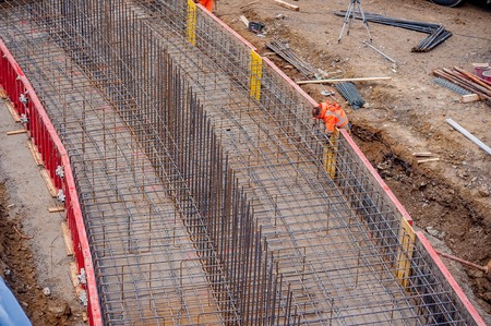 Over the Colle Bergamo Italy November 11, 2017: Carpentry workers to build sewage purifiersのeditorial素材