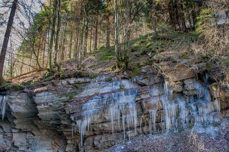 icy rocks with stalactitesの写真素材