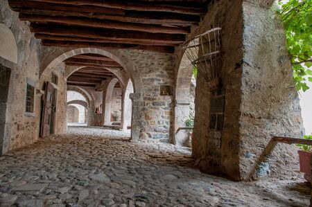 Ancient village with arches at sunsetの写真素材