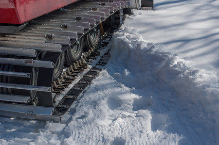 mechanical means crawler to beat the ski slope