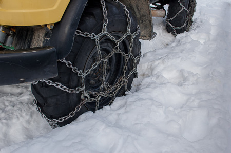 tire with snow chainsの写真素材