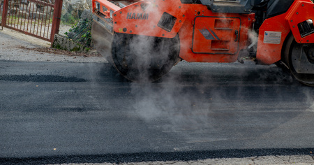 zorzone Italy November 14th 2018:workers at work to redo the road surface