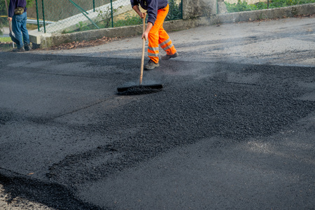 zorzone Italy November 14th 2018:workers at work to redo the road surfaceのeditorial素材