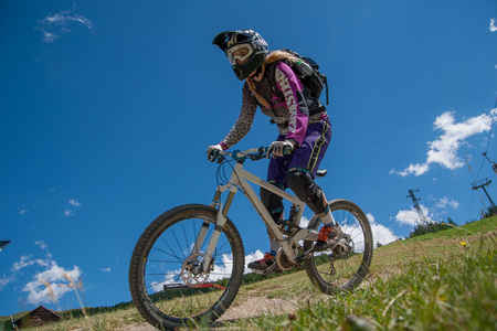 Livigno italy 27th July 2015: descent along the ski slope by bikeのeditorial素材