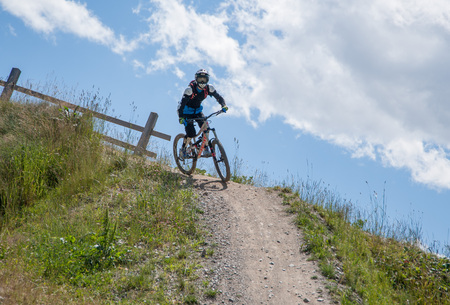 Livigno italy 27th July 2015: descent along the ski slope by bikeのeditorial素材