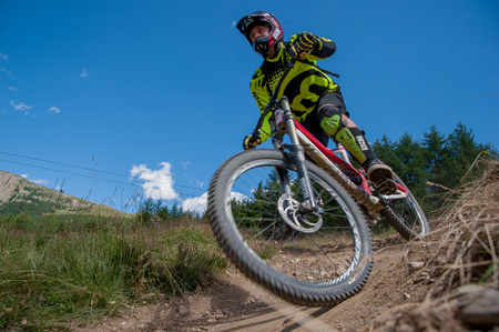 Livigno italy 27th July 2015: descent along the ski slope by bikeのeditorial素材