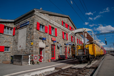 Bernina Switzerland 27July 2015: hospice railway station red train berninaのeditorial素材