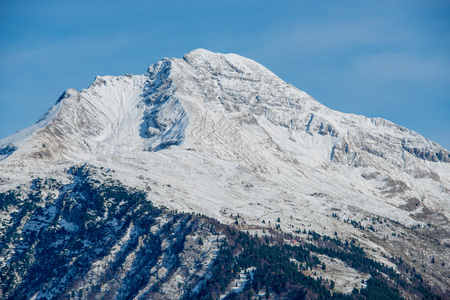 the snowy mountain arera appears from the cloudsの写真素材