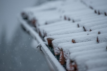 roof during an abundant snowfallの写真素材