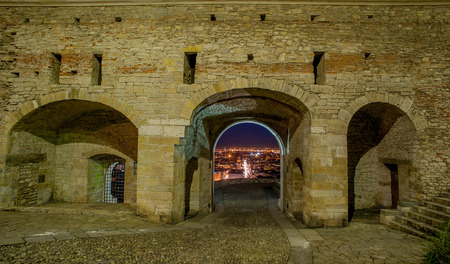 gate of Venetian walls at night in Bergamoの写真素材