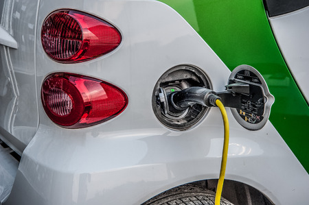 Trezzo italy 11 June 2015: electric car while charging the energy batteryの写真素材