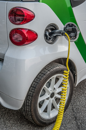 Trezzo italy 11 June 2015: electric car while charging the energy batteryの写真素材