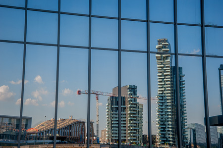 modern architectural constructions in milanの写真素材