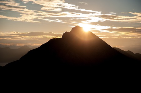 Dawn in the mountains with fogの写真素材