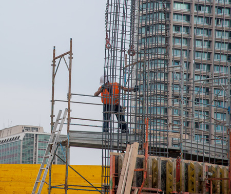 Milan Italy September2014:worker prepares for reinforced concreteのeditorial素材