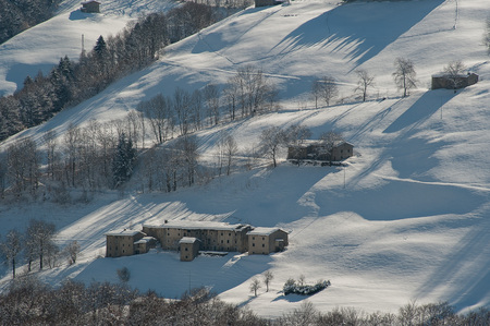 mountain village covered by snowの写真素材
