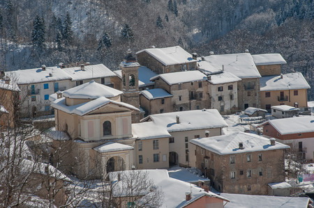 mountain village covered by snowの写真素材