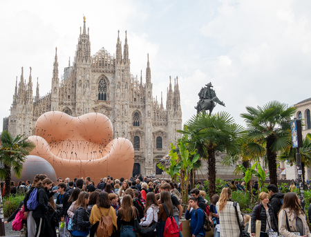 milan italy 10 april 2019: Installation in piazza del duomo. Inspired by an icon of international design, the Up 5 & 6 armchair designed by Gaetano Pesce in 1969, the installation is a social work against violence against women.のeditorial素材