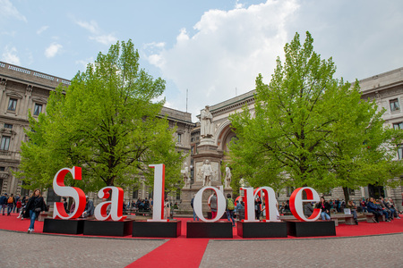 Milan Italy 10 April 2019: Installation to advertise the outside salon with a statue of Leonardo da Vinci in the backgroundのeditorial素材