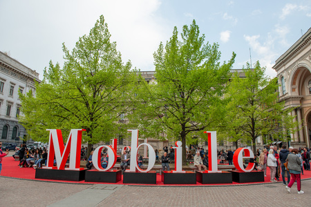 Milan Italy 10 April 2019: Installation to advertise the outside salon with a statue of Leonardo da Vinci in the backgroundのeditorial素材
