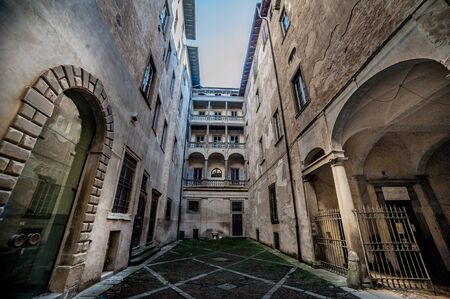 Old courtyard in Bergamo high townの写真素材