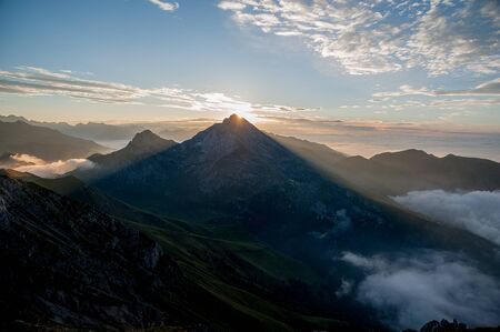 Dawn in the mountains with fogの写真素材