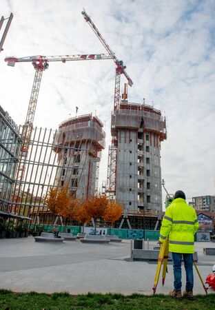 Milan, December 4, 2019: designer controls execution of the construction of a new library. the project of architectural redevelopment of the neighborhoodの写真素材